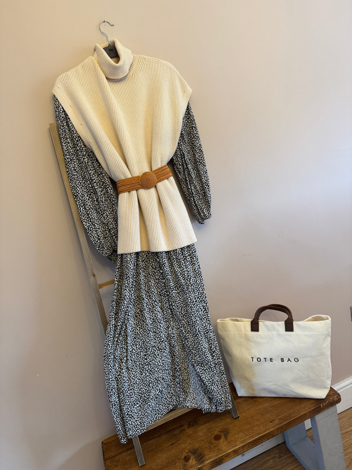 Cream roll neck sleeveless knit