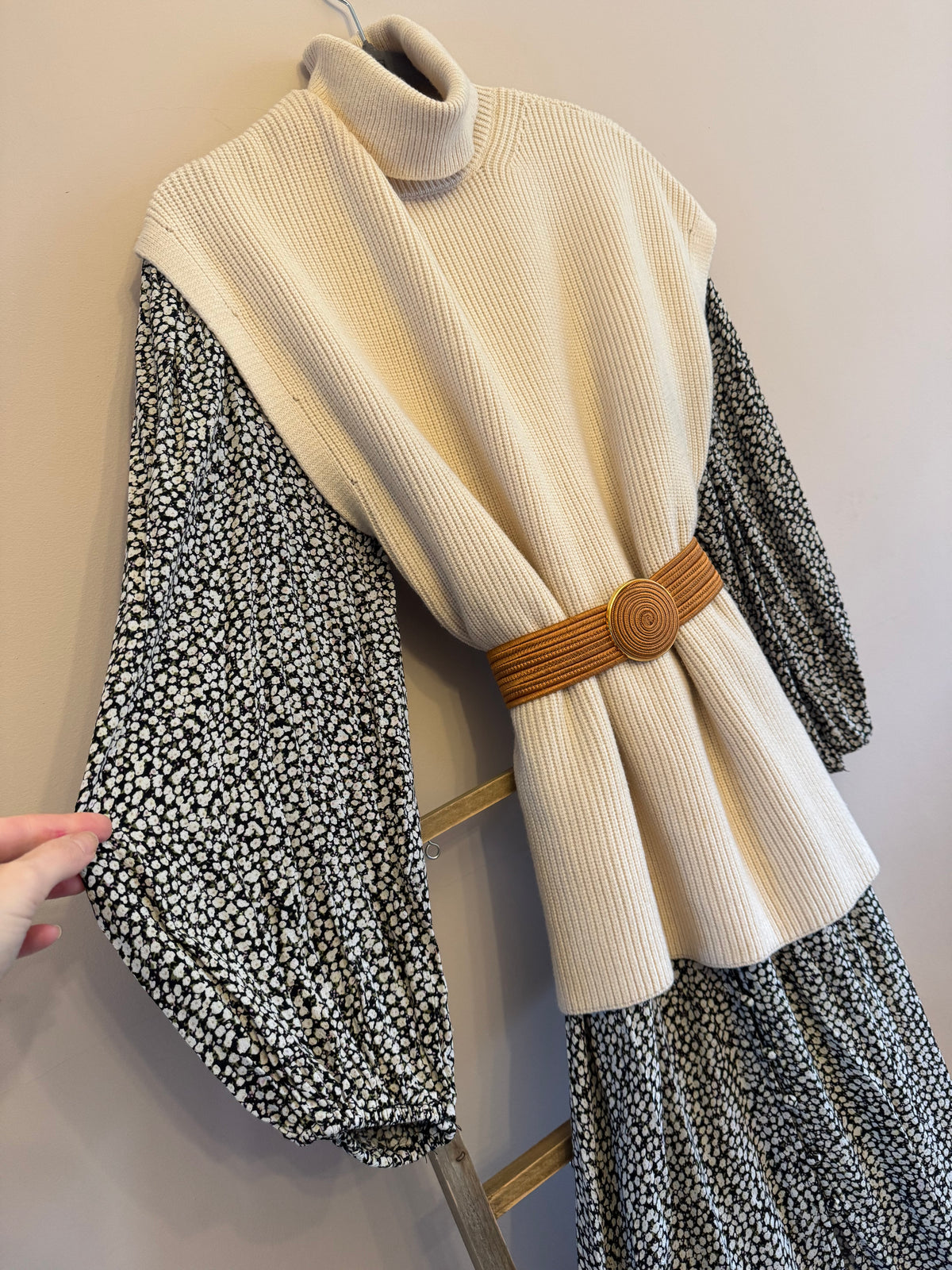 Cream roll neck sleeveless knit