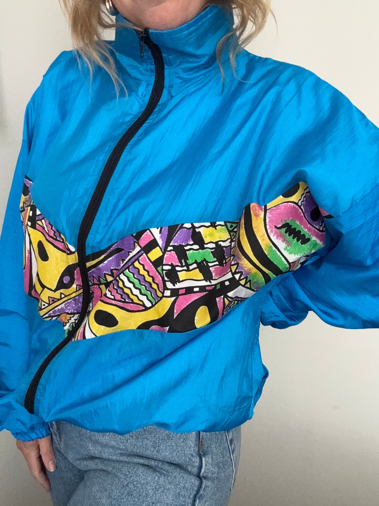 Vintage 1990s windbreaker jacket.