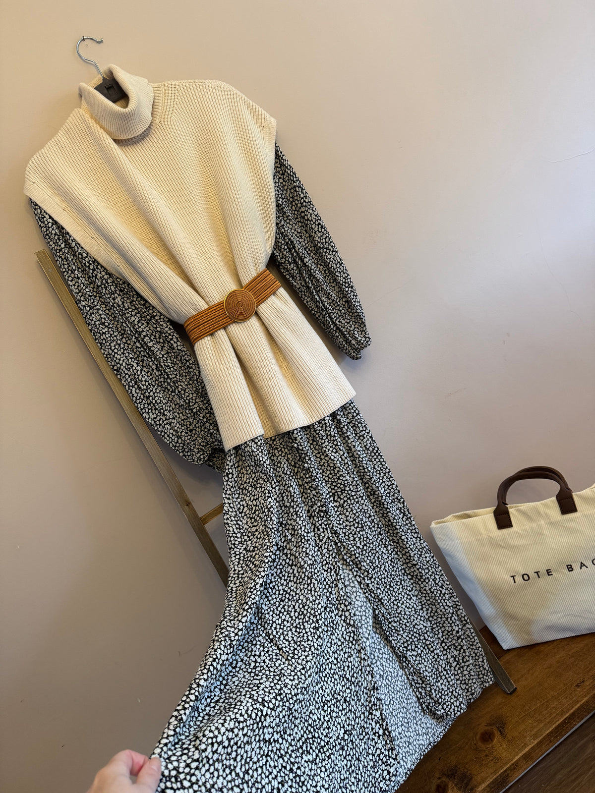 Cream roll neck sleeveless knit