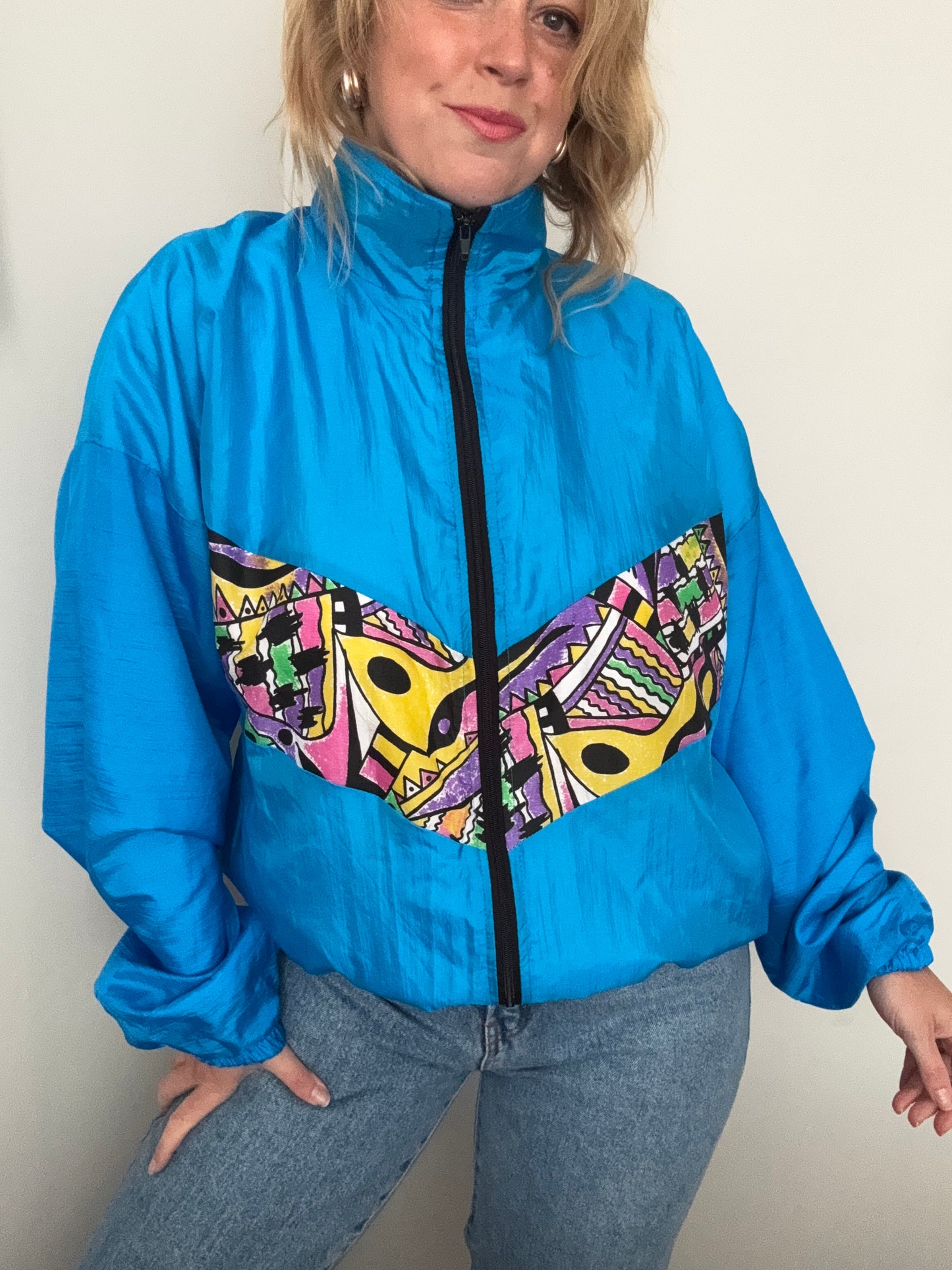Vintage 1990s windbreaker jacket.